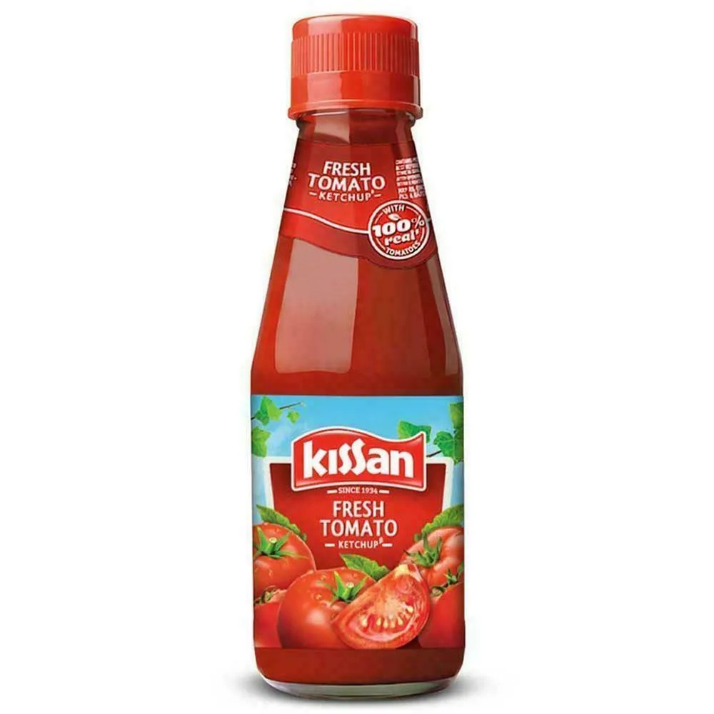 About the Product Kissan Fresh Tomato Ketchup is crafted from 100% real, naturally ripened tomatoes, delivering a tangy and authentic flavor. This versatile ketchup enhances the taste of a wide variety of dishes, from crispy pakodas to vegetables and roti-sabzi, making every meal more enjoyable. Since its inception in 1934, Kissan has become a leading food brand in India, dedicated to supporting farmers throughout the tomato cultivation process. HUL partners with over 8,000 farmers, providing them with essential knowledge and expertise in sustainable agricultural practices to ensure high-quality tomatoes for Kissan Ketchup. Storage Store in a cool, dry place. Once opened, refrigerate between 3-10°C and use within 6 months or by the best-before date. Do not purchase if the product is bloated or damaged. How to Use Kissan Fresh Tomato Ketchup